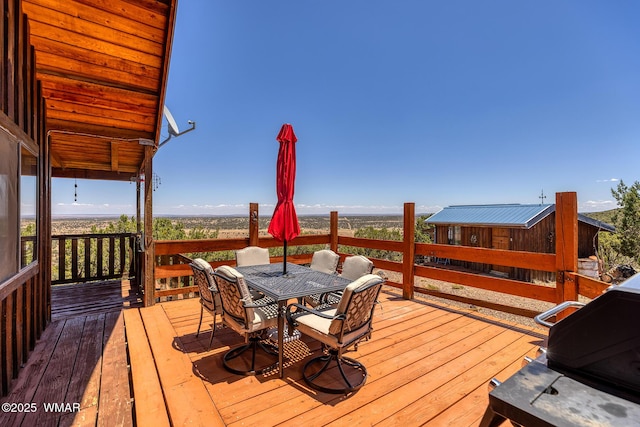4269 Rock Rd, Snowflake, AZ 85937 - wooden terrace with outdoor dining space and area for grilling