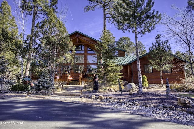 2100 E Ridge Dr, Pinetop, AZ 85935 - view of front facade with metal roof