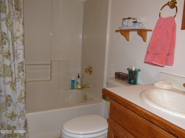 bathroom with vanity, shower / tub combo with curtain, and toilet