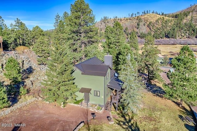 drone / aerial view featuring a mountain view