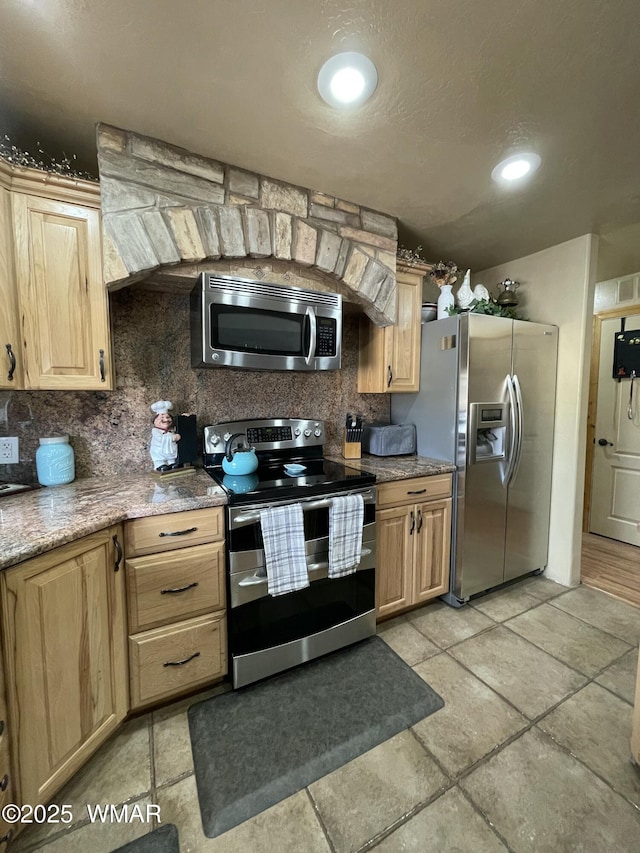 183 N Becker Lake Rd, Springerville, AZ 85938 - kitchen featuring stainless steel appliances, light brown cabinets, backsplash, light stone countertops, and recessed lighting