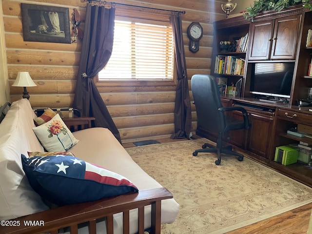 183 N Becker Lake Rd, Springerville, AZ 85938 - home office featuring log walls and wood finished floors