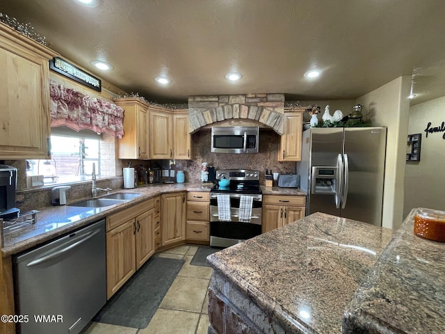 183 N Becker Lake Rd, Springerville, AZ 85938 - kitchen with stainless steel appliances, light brown cabinets, backsplash, and recessed lighting