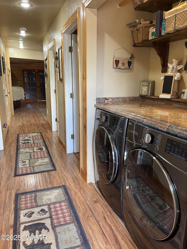 183 N Becker Lake Rd, Springerville, AZ 85938 - washroom featuring wood finished floors and independent washer and dryer