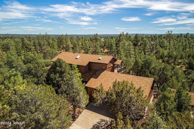 drone / aerial view with a forest view