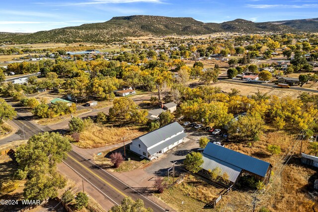 69 E Central Ave, Eagar, AZ 85925 - birds eye view of property with a mountain view