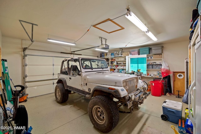 garage featuring a garage door opener