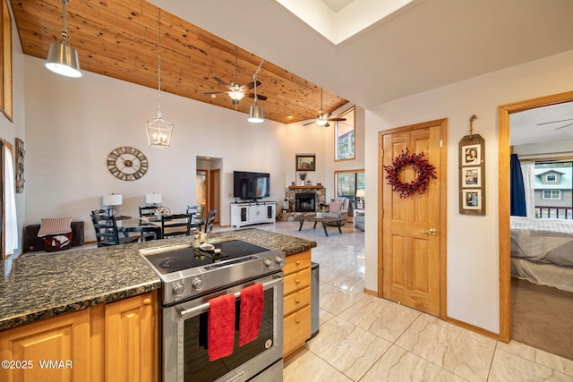 kitchen with decorative light fixtures, wood ceiling, electric stove, high vaulted ceiling, and a ceiling fan