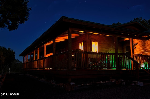 view of property exterior at night