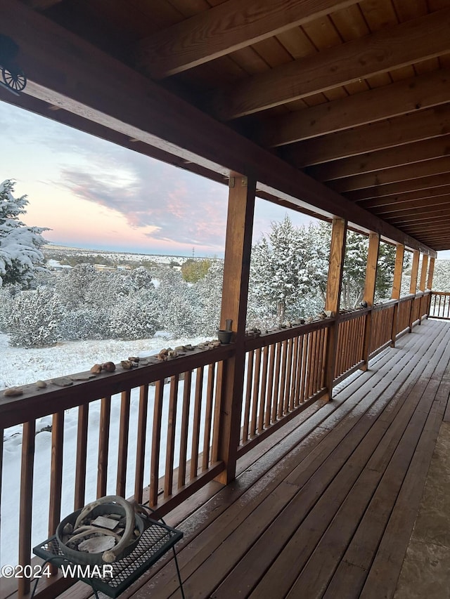 view of snow covered deck