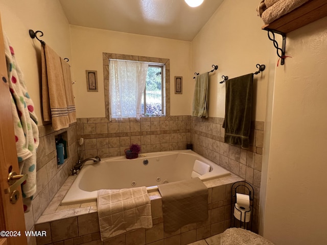 bathroom with a jetted tub