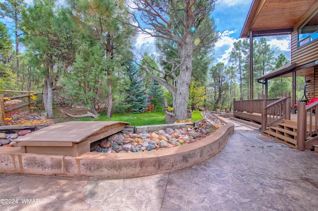 view of patio with a wooden deck