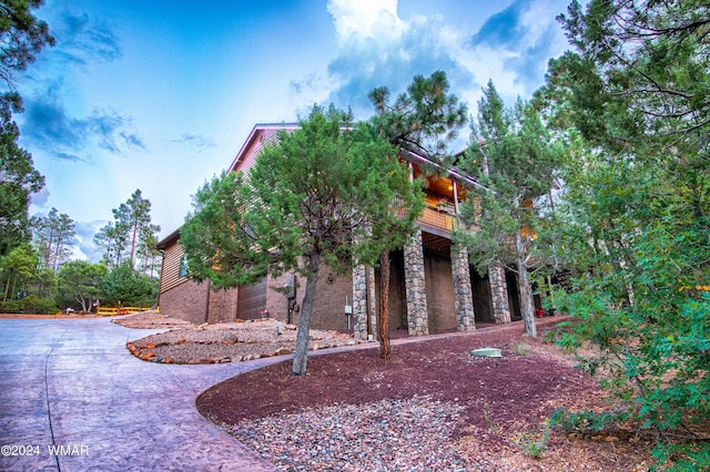 view of home's exterior with stone siding