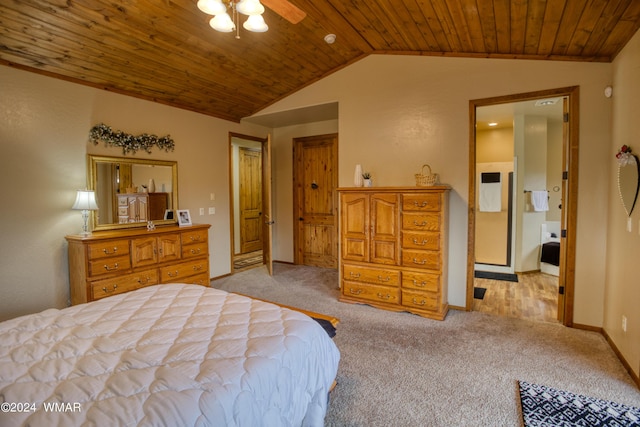 bedroom featuring light colored carpet, a ceiling fan, vaulted ceiling, wooden ceiling, and baseboards