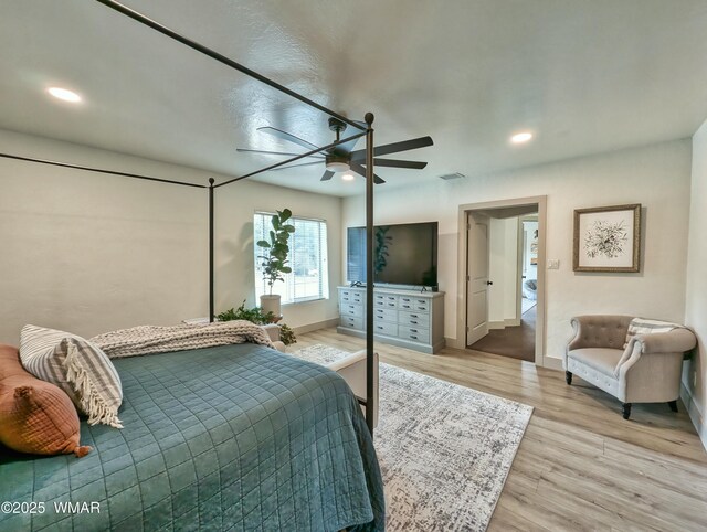 bedroom with light wood-type flooring, visible vents, a ceiling fan, recessed lighting, and baseboards