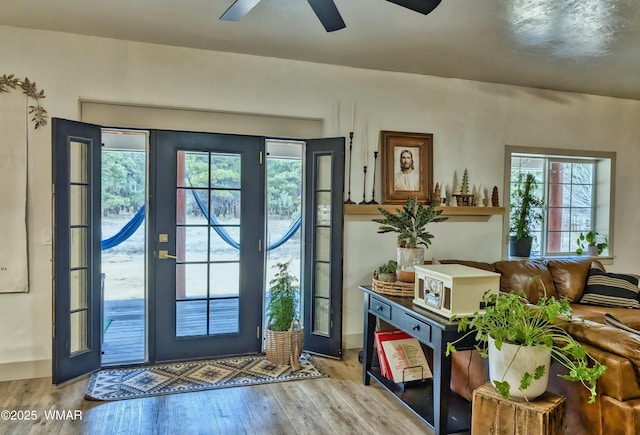 entrance foyer featuring ceiling fan and hardwood / wood-style flooring