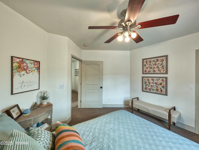 bedroom with baseboards, a ceiling fan, and carpet flooring