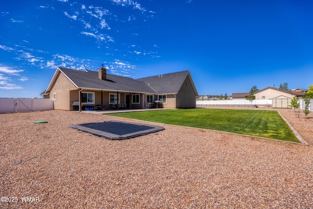 7758 James Pearce Way, Taylor, AZ 85939 - rear view of house with a patio area, a fenced backyard, a gate, a chimney, and stucco siding