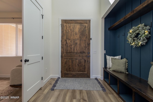 7758 James Pearce Way, Taylor, AZ 85939 - mudroom featuring wood finished floors and baseboards