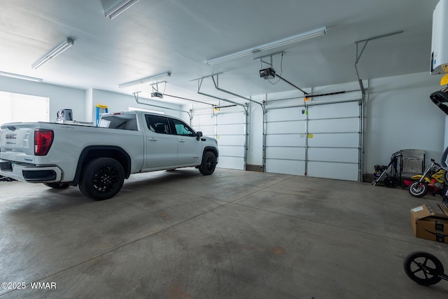 7758 James Pearce Way, Taylor, AZ 85939 - garage featuring a garage door opener