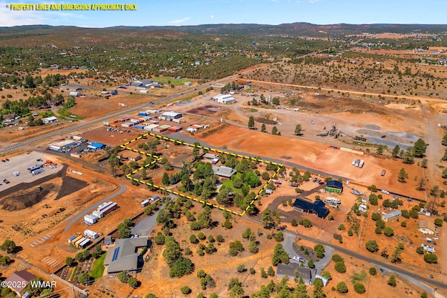 1030 Chamberlain Way, Show Low, AZ 85901 - aerial view of property and surrounding area with a mountainous background