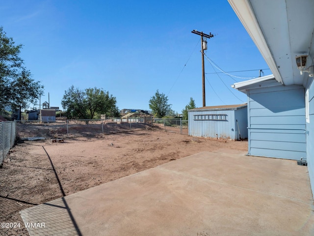 view of yard featuring a patio and a fenced backyard