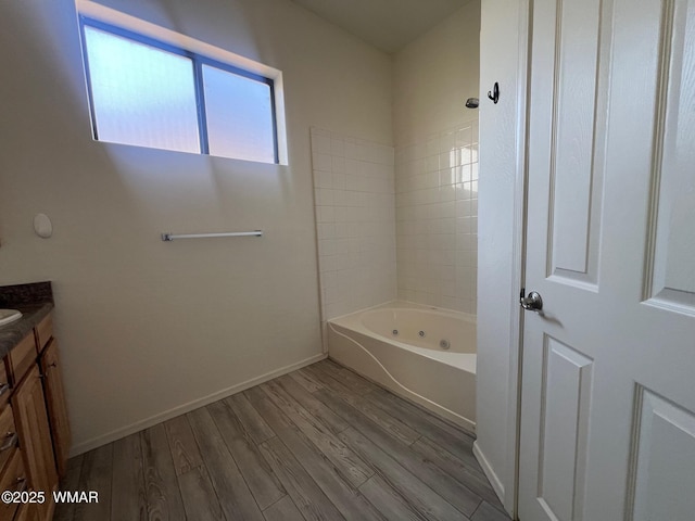 420 Washington St, Snowflake, AZ 85937 - bathroom featuring vanity, baseboards, and wood finished floors