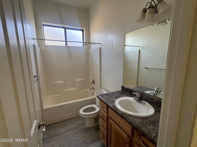 420 Washington St, Snowflake, AZ 85937 - bathroom with shower / bath combination, vanity, toilet, and wood finished floors