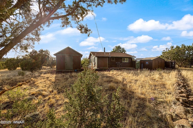 1919 Daggs St, Show Low, AZ 85901 - view of yard featuring a storage unit