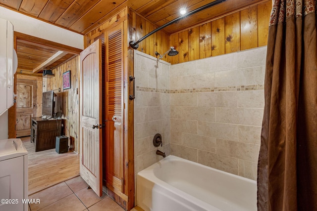 1919 Daggs St, Show Low, AZ 85901 - full bath with wood ceiling, shower / bath combo with shower curtain, wooden walls, tile patterned flooring, and vanity