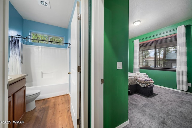 242 E Pinecrest Dr, Pinetop, AZ 85935 - full bath with toilet, vanity, bathing tub / shower combination, and wood finished floors
