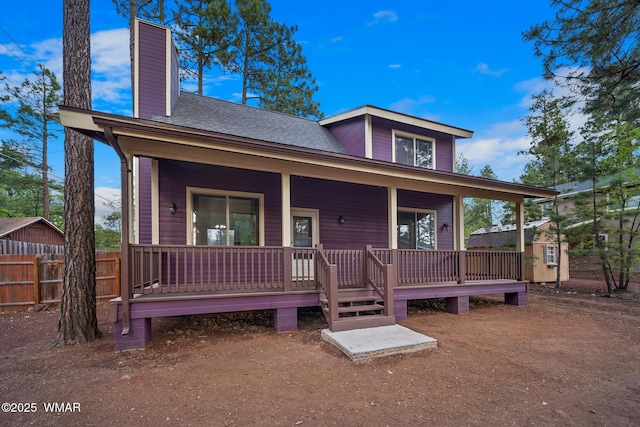 242 E Pinecrest Dr, Pinetop, AZ 85935 - view of front of property with a chimney, roof with shingles, and covered porch