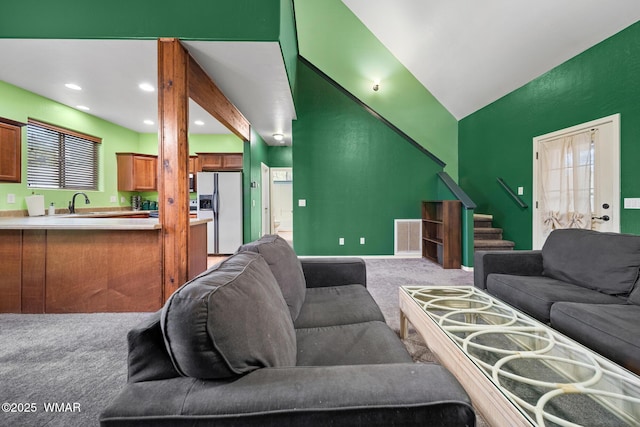 242 E Pinecrest Dr, Pinetop, AZ 85935 - living area with carpet, vaulted ceiling, stairs, and baseboards