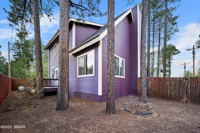 242 E Pinecrest Dr, Pinetop, AZ 85935 - view of side of property with crawl space, a fenced backyard, and a wooden deck