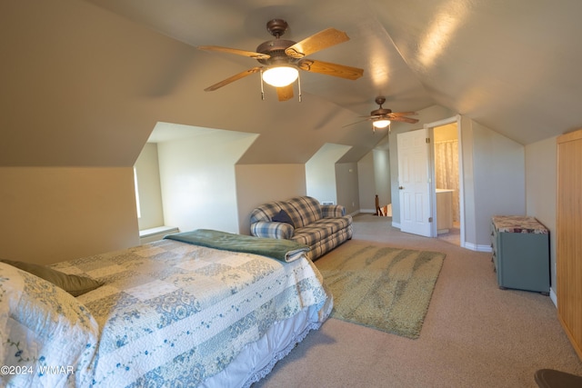 bedroom featuring a ceiling fan, lofted ceiling, and light carpet