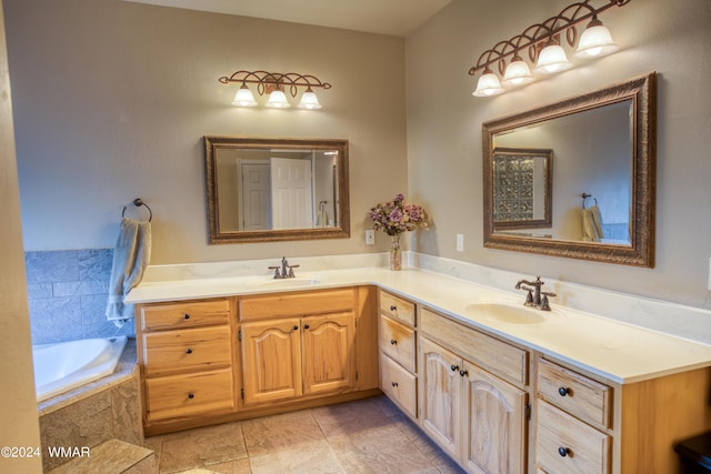 full bathroom with double vanity, a sink, and a bathing tub