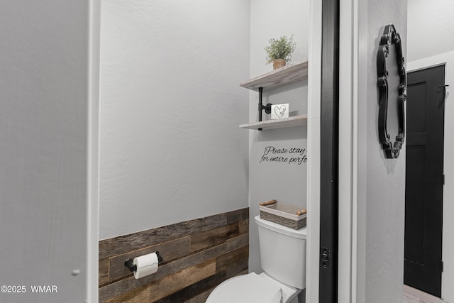 bathroom featuring toilet