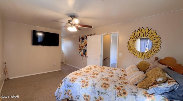 bedroom featuring dark carpet, a ceiling fan, and baseboards