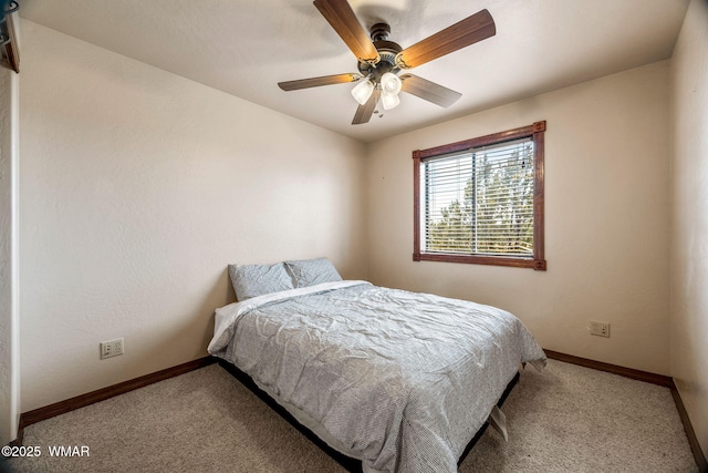 bedroom with baseboards, a ceiling fan, and carpet floors