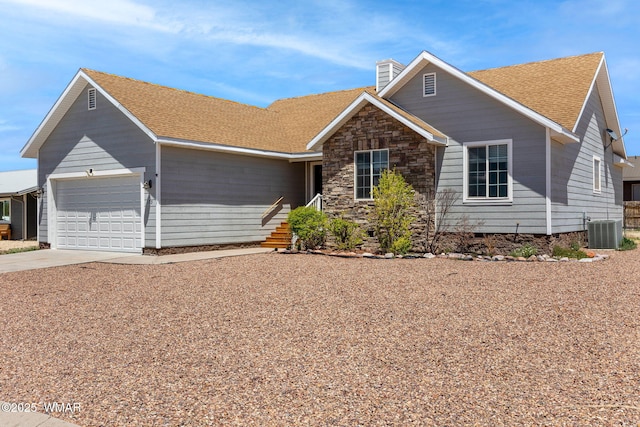 175 N Divot Dr, Eagar, AZ 85925 - single story home featuring central AC, a garage, driveway, a chimney, and roof with shingles