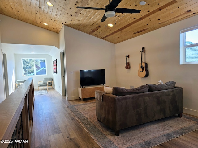 living room with dark wood-type flooring, recessed lighting, wooden ceiling, baseboards, and vaulted ceiling