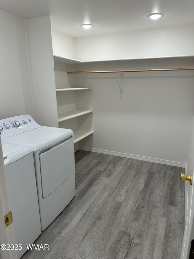 195 S 4th St, Snowflake, AZ 85937 - clothes washing area featuring laundry area, independent washer and dryer, and light wood-type flooring