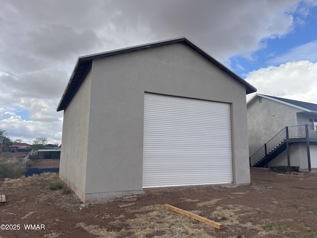 195 S 4th St, Snowflake, AZ 85937 - view of side of home featuring stairs and stucco siding