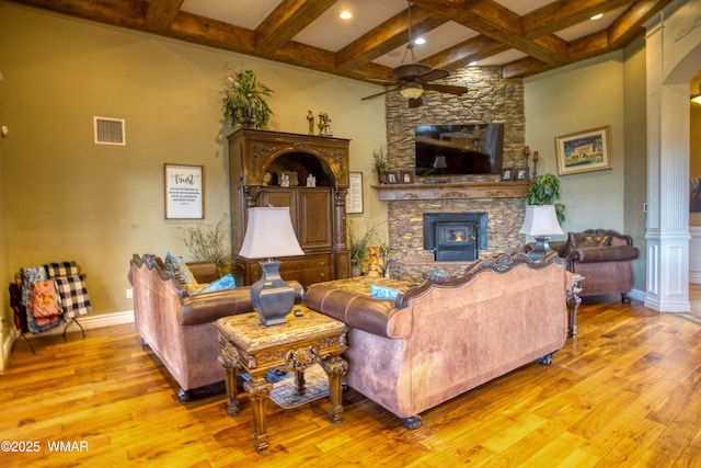 7444 Caldwell Canyon Rd, Snowflake, AZ 85937 - living room with ornate columns, a ceiling fan, hardwood / wood-style flooring, beamed ceiling, and coffered ceiling
