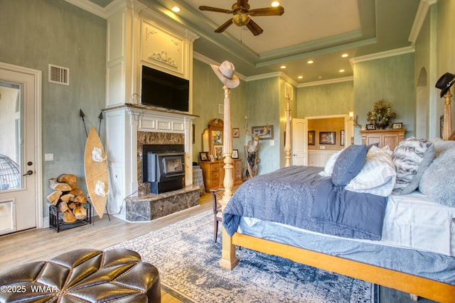 7444 Caldwell Canyon Rd, Snowflake, AZ 85937 - bedroom with light wood-type flooring, ornamental molding, a raised ceiling, and recessed lighting