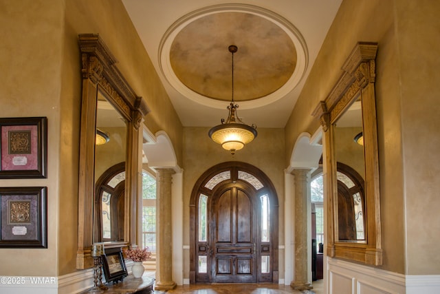 7444 Caldwell Canyon Rd, Snowflake, AZ 85937 - foyer with ornate columns, a towering ceiling, and arched walkways