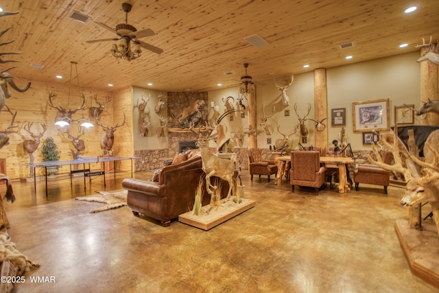 7444 Caldwell Canyon Rd, Snowflake, AZ 85937 - living room with ceiling fan, finished concrete flooring, wooden ceiling, recessed lighting, and a fireplace