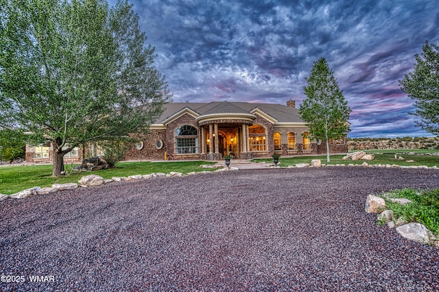 7444 Caldwell Canyon Rd, Snowflake, AZ 85937 - view of front facade with a chimney and a yard