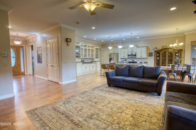 7444 Caldwell Canyon Rd, Snowflake, AZ 85937 - living room with a chandelier, ceiling fan, light wood finished floors, recessed lighting, and baseboards