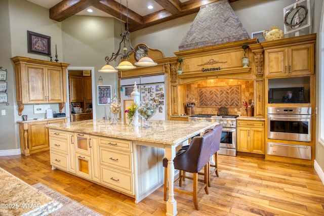 7444 Caldwell Canyon Rd, Snowflake, AZ 85937 - kitchen featuring premium appliances, a warming drawer, a high ceiling, beam ceiling, and a center island